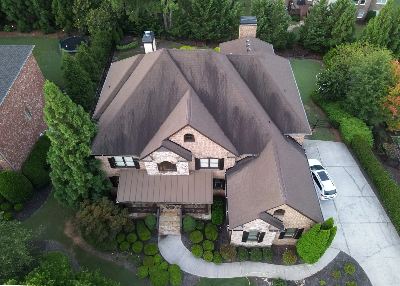 Before and after Soft Wash Roof Cleaning